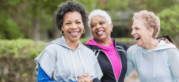 Women Laughing in the park WeightWiseHub